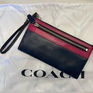 Coach wristlet wallet. Navy and pink. Holds phone, credit cards and more!